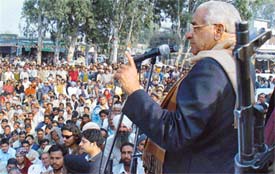 Mr Bhajan Lal, former Chief Minister, addresses an election rally at Barwala on Monday