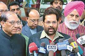 BJP leader Mukhtar Abbas Naqvi along with Vijay Kumar Malhotra and S.S. Ahluwalia addressing media persons after meeting the Election Commissioner on the law and order situation in Bihar, in New Delhi on Monday. 