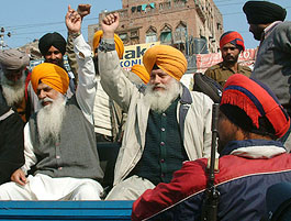 Members of the Dal Khalsa being taken away by policemen after they courted arrest outside the Golden Temple in Amritsar on Monday.