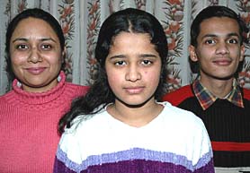 Deepika, a student of Carmel Convent, and Rohan, a student of St Kabir, who participated in the National Science Congress held recently at Guwahati. Their guide, Ms Archna Puri, is also seen in the picture. 