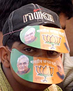 A child sports caps with the BJP election symbol at a rally addressed by former Prime Minister Atal Bihari Vajpayee in Gurgaon