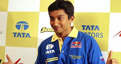 Narain Karthikeyan, Indian motor racing driver, poses for photographers in Mumbai
