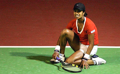 Shikha Uberoi of the US reacts after losing a point to Spain's Conchita Martinez during their first round match at the Volvo Women's Open in Pattaya