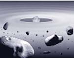 Illustration of a debris disk surrounding a young red dwarf star. The stellar wind from the red dwarf star removes the dust in the debris disk by causing the dust to slowly spiral into the star. 