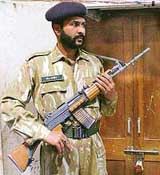 A paramilitary commando on Friday stands guard outside Arya Girls College, Ambala