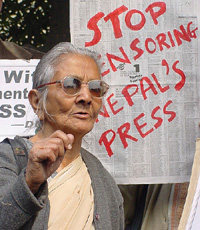 Shanta Toofan, a social worker from Nepal, participates in a demonstration organised by the Delhi Union of Journalists against the Nepal King and demands the removal of ban on the media at Nepal Embassy in New Delhi on Saturday. 