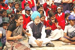 Students dressed as Prime Minister Manmohan Singh and Congress President Sonia Gandhi