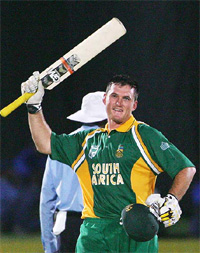South African captain Graeme Smith celebrates after reaching his century