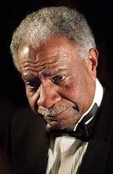 ctor Ossie Davis attends his 50th wedding anniversary party at a New York hotel in this 1998 file photo