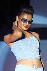 A model displaying "Shades", the eye fashion boutique's eye wear, during a fashion show