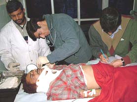 One of the injured passengers, Om Prakash, receives treatment at the Udhampur district hospital