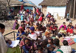 Students attending classes in the open due to lack of proper infrastructure at Haweli Kalna in Ropar district.