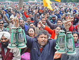 Thousands of employees of electricity boards from Northern India stage dharna in Chandigarh on Monday.         