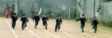 Tiny tots take part in a race during the annual sports meet of Bhartiya Vidya Mandir School