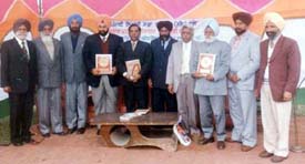Prof Gurbhajan Gill, Mr M.S. Manupuri and Dr Satish Verma along with others at the annual function of the Punjabi Likhari Sabha, Rampur, on Sunday