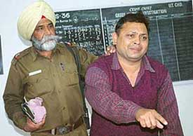 Rajinder Pal in custody in Sector 36 Police Station, Chandigarh, on Tuesday