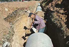 The laying of storm water drainage pipes in progress in Phase V of Mohali on Tuesday