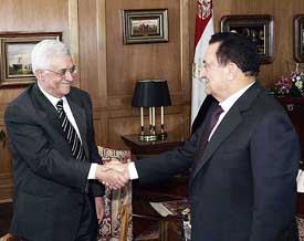 Egyptian President Hosni Mubarak shakes hands with Palestinian Authority President Mahmoud Abbas prior to their meeting at the Red Sea resort of Sham el-Sheik, Egypt, on Tuesday.