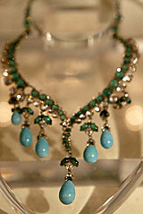 A simulated turquoise, emerald and diamond necklace is displayed at a preview of Sothebys auction