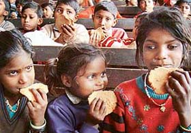 Children of Government High School, Sector 25, enrolled under the Sarv Shiksha Abhiyan have meal of matthis in Chandigarh