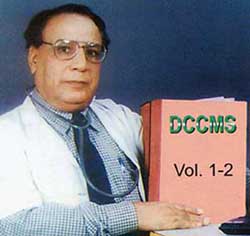 Dr Garg with the two volumes of the software he has developed for medical diagnosis. 