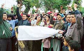 Activists of the Pravasi Nepali Sangh (Bharat) stage a protest against King Gyanendra in Ludhiana on Wednesday.