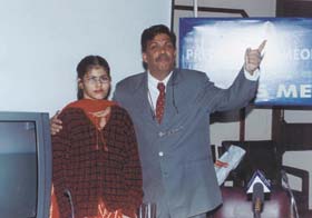 The Director of Predictive Homoeopathy, Dr Prafull Vijaykar, with one of his patients, Diksha Bahiti, at a press conference
