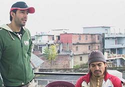 Actors Syed Julfi and Shabir Ali in Hamirpur on Thursday.