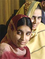 Ayesha, a 13-year old Pakistani girl, who has undergone an open heart surgery at KIMS in Trivandrum, with her mother Atiya at a Press conference in New Delhi on Friday. 