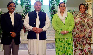 In this picture released by the Pakistan Muslim League, Pakistans ousted and exiled Prime Minister Nawaz Sharif poses with another Pakistans self-exiled Premier Benazir Bhutto after their meeting in Jeddah, Saudi Arabia, on Thursday