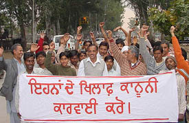 Residents of Kaimbwala village outside Phase I Police Station at Mohal