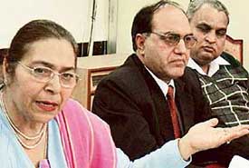 Ms Uma Wadhera, general secretary of the Association of Private Educational Institutions, explains a point during a press conference in Chandigarh
