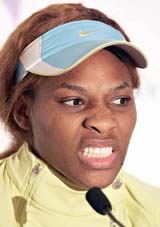 Serena Williams addresses a press conference to announce her withdrawal for medical reasons from her quarterfinal against Dinara Safina of Russia at the 13th Open Gaz de France tennis tournament in Paris