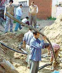 BSNL personnel work overtime to restore communication in Sector 45-A in Chandigarh