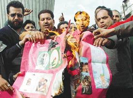 Shiv Sena activists burn Valentines Day cards in Ludhiana on Monday. 