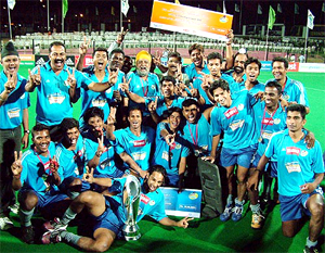 Members of Hyderabad Sultans, winner of the inaugural PHL, pose with the trophy in Hyderabad on Sunday