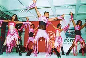 A dance troupe performs during the Valentine bash