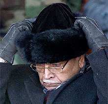 External Affairs Minister Natwar Singh adjusts his cap in Kabul on Tuesday