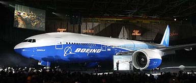 The first Boeing 777-200LR Worldliner is presented to employees and press on Tuesday at the Boeing Co. assembly facility in Everett, Washington. The aircraft can carry 301 passengers up to 9,420 nautical miles and is considered to be the companys answer to the Airbus 380 super-jumbo airplane.