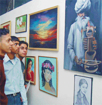 Students at a painting exhibition in Government College, Sector 46, Chandigarh