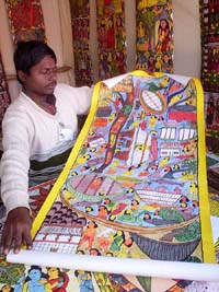 Montu Chitrkaar displays his painting at Sheesh Mahal in Patiala on Wednesday.