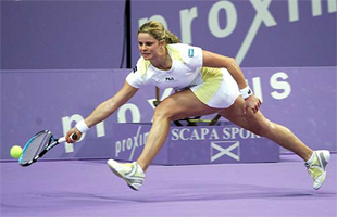Belgium's Kim Clijsters runs for the ball during her match against Croatia's Jelena Kostanic 