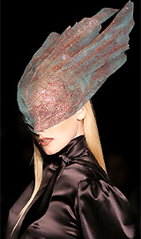 A model wears an outfit by Frost French during their show at London Fashion Week