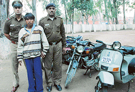 Nanu, an auto thief, in police custody in Chandigarh on Thursday.