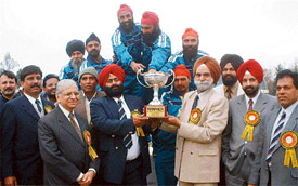 The Punjab circle contingent receives trophy at the 4th All-India BSNL Cycling Meet in Ludhiana on Saturday