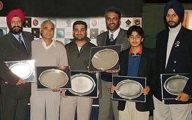 Winners in various categories of the Royal Challenge Samarvir Sahi Amateur Golf Tournament with their trophies at Golf Club, Chandigarh