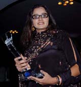 Tennis sensation Sania Mirza holds the Young Achiever Award at the second Womens Awards at Siri Fort auditorium in New Delhi on Friday night