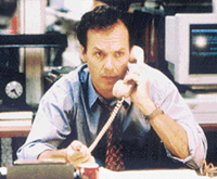 Michael Keaton plays a harried editor in The Paper