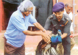 President APJ Abdul Kalam with a sick peacock