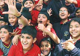 Students cheer fellow runners of the Cross-Country race of Yadavindra Public School, Mohali